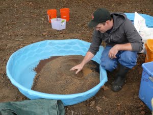 Shawn Woods (Oregon Department of Fish and Wildlife) mixing native forb seed