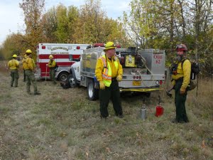 Philomath Fire & Rescue and Oregon Department of Forestry personnel discuss the plan of action for the prescribed burn